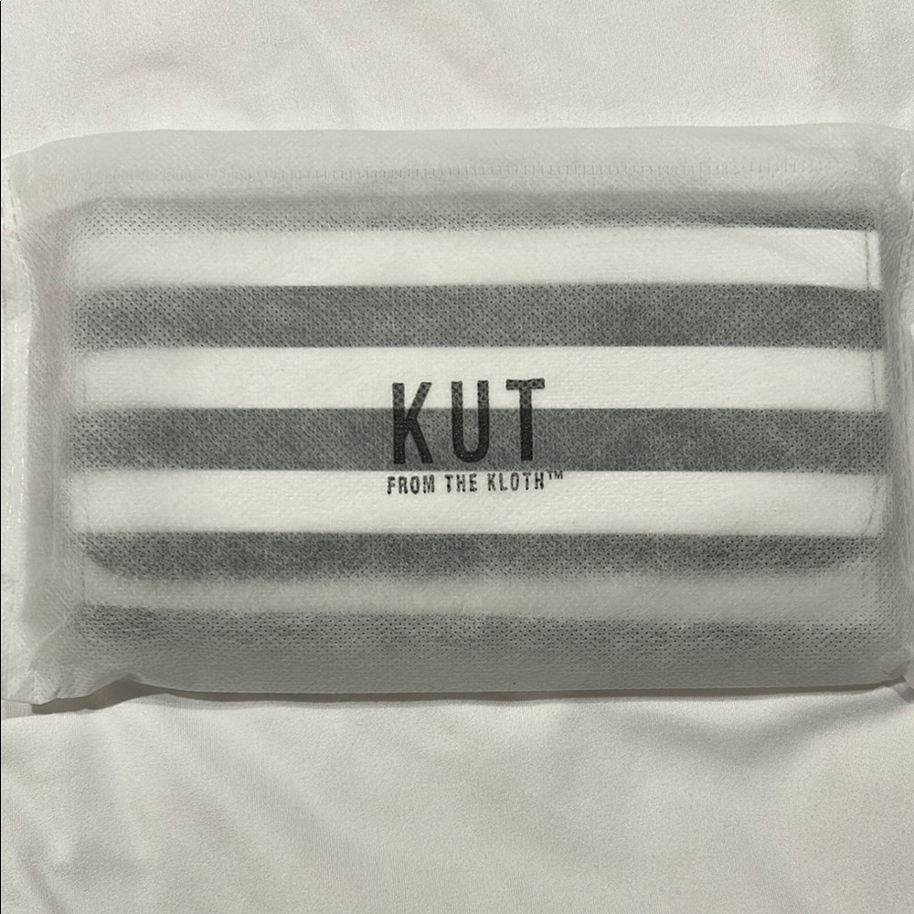 Brand new! Kut From The Kloth Black and White Striped Pouch with 8 card holders.